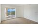 Bright bedroom with balcony access and water views at 14021 Bellagio Way # 201, Osprey, FL 34229