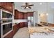Modern kitchen with stainless steel appliances and granite countertops at 1900 Colleen St, Sarasota, FL 34231