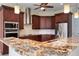 Modern kitchen with stainless steel appliances and granite countertops at 1900 Colleen St, Sarasota, FL 34231