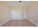 Spacious bedroom with wood floors and large closet at 1900 Colleen St, Sarasota, FL 34231