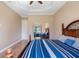 Main bedroom with wood floors and mirrored closet at 1900 Colleen St, Sarasota, FL 34231