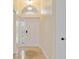 Bright entryway with tile flooring and an arched window at 1900 Colleen St, Sarasota, FL 34231