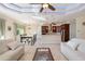 Open-concept living area with a kitchen, dining area, tile floors, and recessed lighting at 1900 Colleen St, Sarasota, FL 34231