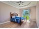 Bright bedroom with wood floors and backyard view at 1900 Colleen St, Sarasota, FL 34231