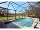 Inviting screened pool with a spacious deck perfect for relaxation at 29205 Saddlebag Trl, Myakka City, FL 34251