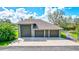 Large three-car garage with extra height for RV parking at 29205 Saddlebag Trl, Myakka City, FL 34251