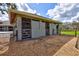 Two-stall barn with individual gated enclosures at 29205 Saddlebag Trl, Myakka City, FL 34251