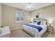 King bedroom with cozy bedding and plenty of natural light at 29205 Saddlebag Trl, Myakka City, FL 34251