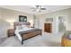 Main bedroom with wood-like flooring, and plenty of natural light at 29205 Saddlebag Trl, Myakka City, FL 34251