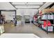Extra large garage with car lift and storage at 29205 Saddlebag Trl, Myakka City, FL 34251