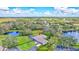 Aerial view of home with pool, and tranquil pasture at 29205 Saddlebag Trl, Myakka City, FL 34251
