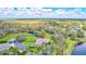 Aerial view of single-story home on large lot at 29205 Saddlebag Trl, Myakka City, FL 34251