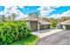 Triple car garage with extra storage space at 29205 Saddlebag Trl, Myakka City, FL 34251