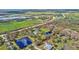 Aerial view of property showcasing expansive lot and tranquil surroundings at 29205 Saddlebag Trl, Myakka City, FL 34251