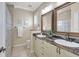 Elegant bathroom with granite countertops and double sinks at 29205 Saddlebag Trl, Myakka City, FL 34251