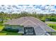 Aerial view of home with pool and large lot, offering serene countryside views at 29205 Saddlebag Trl, Myakka City, FL 34251