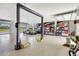 Large garage with car lift and storage at 29205 Saddlebag Trl, Myakka City, FL 34251