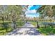 Ornate entrance gate to a private estate at 29205 Saddlebag Trl, Myakka City, FL 34251