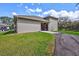Spacious garage with additional storage at 29205 Saddlebag Trl, Myakka City, FL 34251