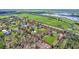 Aerial view of property showcasing expansive lot and tranquil surroundings at 29205 Saddlebag Trl, Myakka City, FL 34251