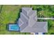 Bird's eye view of the house, showcasing the roofline and landscaping at 29205 Saddlebag Trl, Myakka City, FL 34251