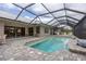 Relaxing screened pool and patio with open views at 3630 Verna Rd, Myakka City, FL 34251