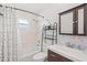Clean bathroom with a shower/tub combo and updated vanity at 4457 Brooksdale Dr, Sarasota, FL 34232