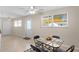Bright dining area with tile floors and access to the backyard at 4457 Brooksdale Dr, Sarasota, FL 34232