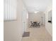 Spacious dining area featuring tile flooring and a ceiling fan at 4457 Brooksdale Dr, Sarasota, FL 34232