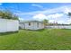 Spacious backyard with shed and grassy area at 4457 Brooksdale Dr, Sarasota, FL 34232