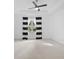 Bright bedroom with a ceiling fan and striped curtains at 805 Molly Cir, Sarasota, FL 34232