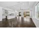 Open floor plan showing the kitchen and living area with sliding glass doors to the outdoor space at 805 Molly Cir, Sarasota, FL 34232