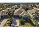 One story house with a blue garage door and palm trees at 805 Molly Cir, Sarasota, FL 34232