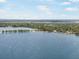 Aerial showcasing waterfront homes and landscape at 2107 Palma Sola Blvd # 61, Bradenton, FL 34209