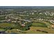 Aerial view of community near golf course and water at 9489 Millbank Dr # 2625, Sarasota, FL 34238