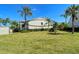 Landscaped backyard with plenty of green space at 9489 Millbank Dr # 2625, Sarasota, FL 34238