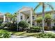 Two-story building with lush landscaping at 9489 Millbank Dr # 2625, Sarasota, FL 34238