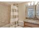 Bathroom with granite countertop and shower/tub combo at 1100 Capri Isles Blvd # 523, Venice, FL 34292