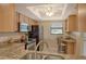 Well-equipped kitchen with stainless steel appliances and granite countertops at 1100 Capri Isles Blvd # 523, Venice, FL 34292