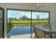 Enjoy peaceful golf course views from this screened lanai at 1100 Capri Isles Blvd # 523, Venice, FL 34292