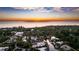 Stunning aerial view of waterfront home at sunset at 1243 Starboard Ln, Sarasota, FL 34242