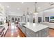 Expansive kitchen with a large island, stainless steel appliances, and bright natural light at 1243 Starboard Ln, Sarasota, FL 34242