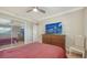 Bright bedroom with mirrored closet and wood furniture at 134 Da Vinci Dr, Nokomis, FL 34275