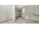 Bathroom with double vanity and shower at 134 Da Vinci Dr, Nokomis, FL 34275