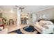 Open living room featuring a comfy seating area and kitchen view at 134 Da Vinci Dr, Nokomis, FL 34275