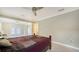 Bedroom with sliding glass doors to backyard at 134 Da Vinci Dr, Nokomis, FL 34275