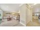 Bright living room with tiled floors and neutral-toned furniture at 134 Da Vinci Dr, Nokomis, FL 34275
