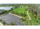 Community dog park with fenced-in areas, benches, and ample parking at 14132 Campfire Ct, Parrish, FL 34219