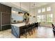 Well-equipped community kitchen, perfect for gatherings, with an island and breakfast bar at 14132 Campfire Ct, Parrish, FL 34219