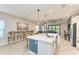 Open concept kitchen with large island and stainless steel appliances at 14132 Campfire Ct, Parrish, FL 34219